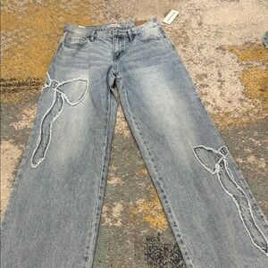 PacSun Light Blue Flare Jeans with Bow Accents